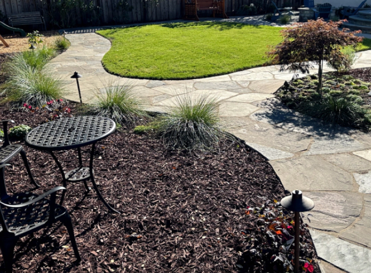 curved walkway with outdoor living space